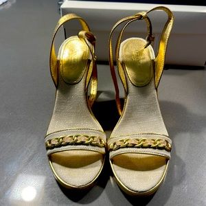 Vintage coach wedges. Gold with flower logo on the cork. Size 8.5 worn once.